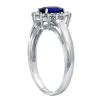 Elegant Oval Blue Sapphire and Diamond Halo Engagement Ring in Yaffie White Gold