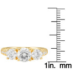 Gold 3-Stone Ring with Brilliant Moissanite Totaling 2.24 Carats by Yaffie Charles & Colvard.