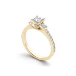 Sparkling Yaffie gold anniversary ring with 1.25 carat TDW diamonds and three striking stones.
