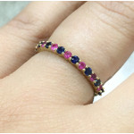 Alternating Ruby and Blue Sapphire Half Eternity Band - Yaffie Shared Prong