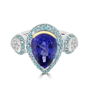 Stylishly elegant, the Yaffie 5.2cts Tanzanite Paraiba Tourmaline and Diamond Ring is a must-have accessory for the fashion-forward individual. This stunning piece combines sparkling diamonds and gorgeous two-tone gemstones to make any outfit pop.
