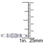 The Yaffie 3-Stone Promise Ring with 1/4ct TDW Round and Parallel Baguette Diamonds in White Gold.