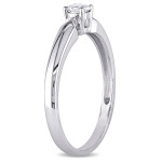 Shine bright with the Yaffie White Gold Diamond Solitaire Engagement Ring (1/5ct TDW).