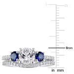White and Blue Sapphire Diamond Bridal Ring Set with 1/3ct TDW in White Gold by Yaffie Created Jewels.