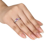 Sparkling White Gold Ring with Gemstones and Diamond Trio.