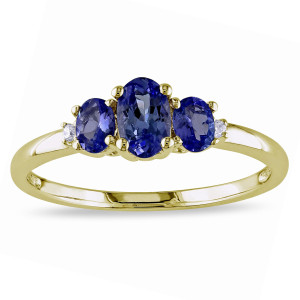 Golden Charm: Three-Stone Ring with Sapphire and Diamonds