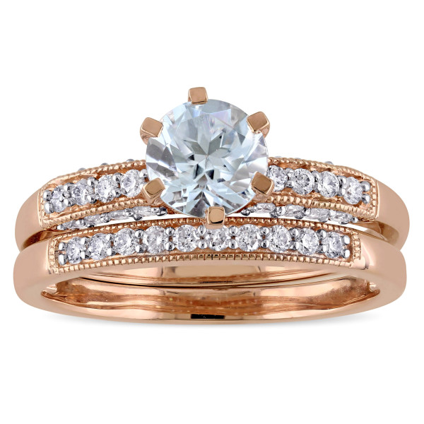 Yaffie signature bridal ring set features a delicate blend of sparkling rose gold, brilliant 1/3ct diamonds, and serene aquamarine stones.