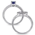 The Yaffie White Gold Bridal Ring with Diffused Sapphire and 1/3ct Diamond Halo from the Signature Collection.