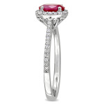 Yaffie Ruby and Diamond Halo Engagement Ring from the Signature Collection in White Gold and Oval-Cut Design with 1/4ct TDW.