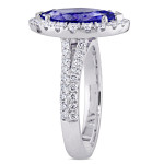 Yaffie Marquise Tanzanite & Diamond Halo Ring from the Signature Collection in White Gold.
