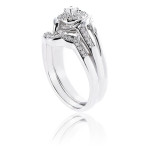 A glimmering Yaffie Sterling Silver Bridal Set with a 1/4ct Diamond Halo.