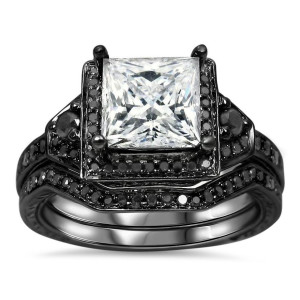 Handmade by Yaffie, this dazzling engagement ring set showcases a 2/5ct TDW black diamond and moissanite stones, exuding exquisite Black Gold vibes.