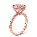 The stunning Yaffie Morganite and Diamond Engagement Ring dazzles in Rose Gold with 1 9/10ct of round-cut brilliance.