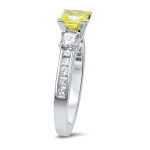 Get enchanted by the Yaffie 3-stone Engagement Ring, featuring a stunning 1 1/2ct TDW Princess-cut Yellow Diamond set in luminous White Gold.