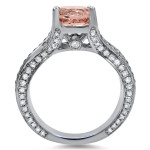 Beautifully crafted, Yaffie White Gold Morganite Diamond Ring boasts a 2 2/5ct TGW Round-cut centerpiece that exudes pure elegance and charm. Perfect for any special occasion, this engagement ring is a true masterpiece.