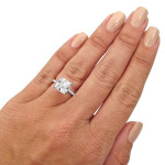Sophisticated White Gold Engagement Ring with Moissanite and White Diamond Accents.