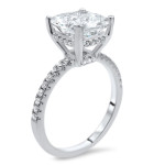 Sophisticated White Gold Engagement Ring with Moissanite and White Diamond Accents.