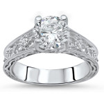 Round-cut Moissanite and Diamond Engagement Ring in Yaffie White Gold