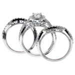 Sparkling Yaffie Platinum Bridal Set with Halo Diamonds totaling 2 2/5ct TDW