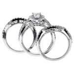 Platinum Yaffie Bridal Set with Braided Mount, Halo Diamonds, and 2 Matching Bands totaling 2 3/4 carats TDW.