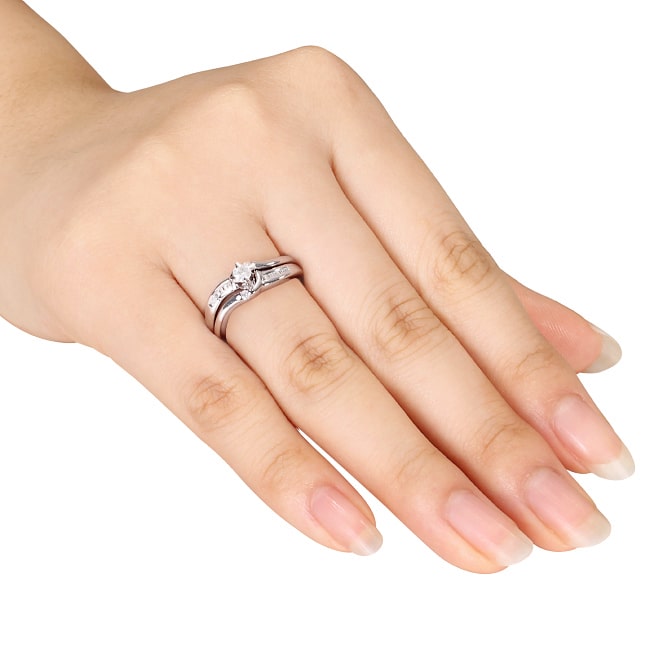 Sparkling Yaffie Sterling Silver Bridal Ring Set with 1/4ct TDW Diamonds