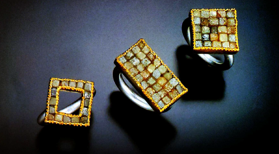 Industrial rough diamond cubes set in jewelry